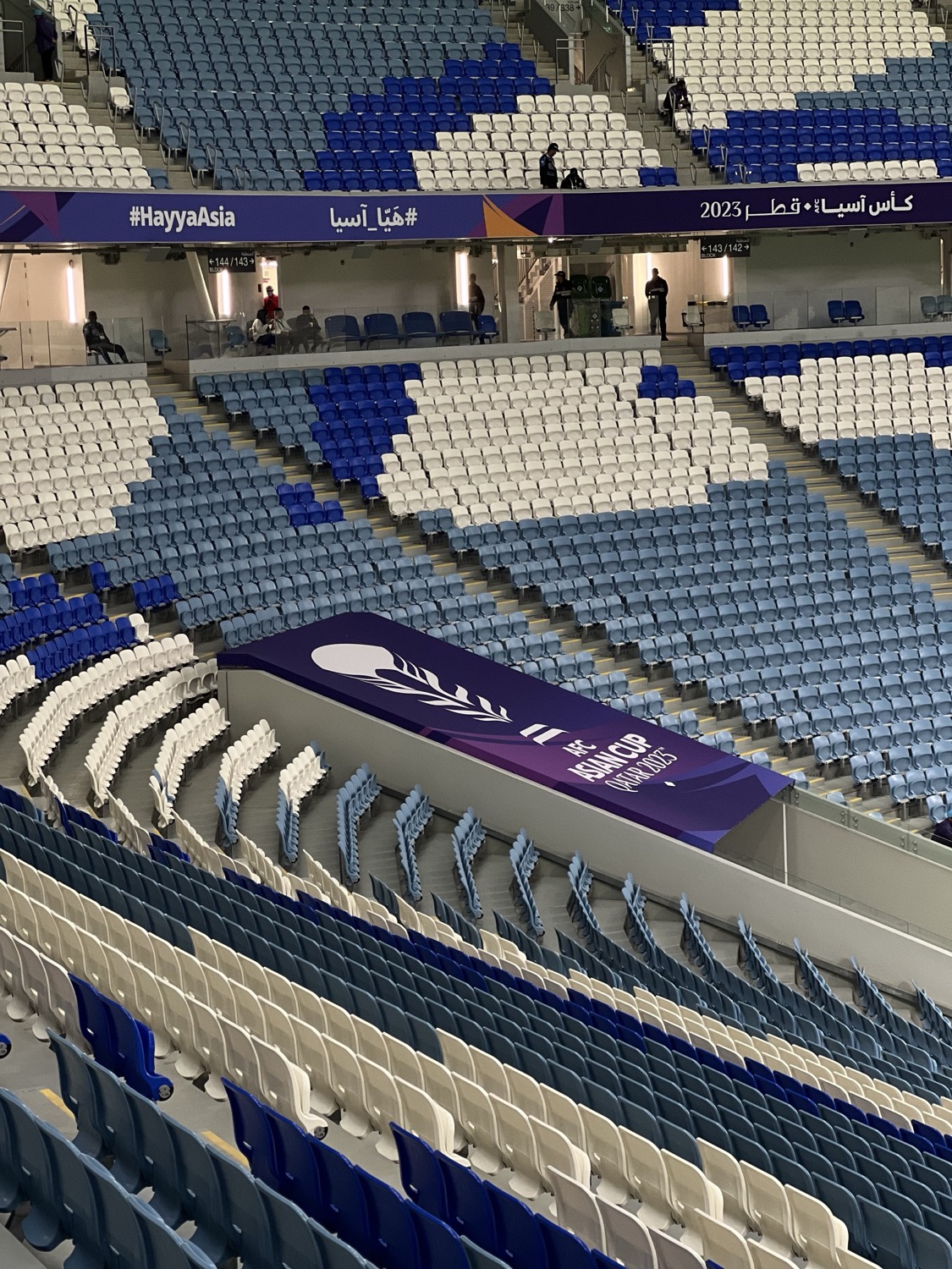 Patterned seating and tournament banner before kick-off, AFC Asian Cup, Qatar