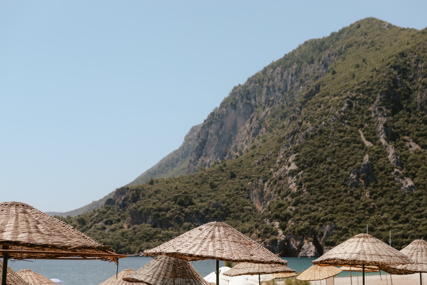 Parasols, the sea, the mountain, Antalya, Türkiye