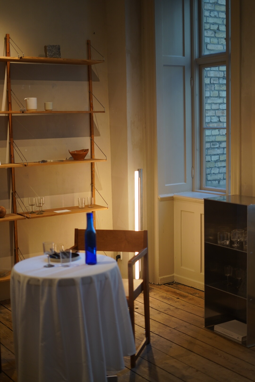 Arranged by use, not display, Apotek 57 cafe interior, Copenhagen