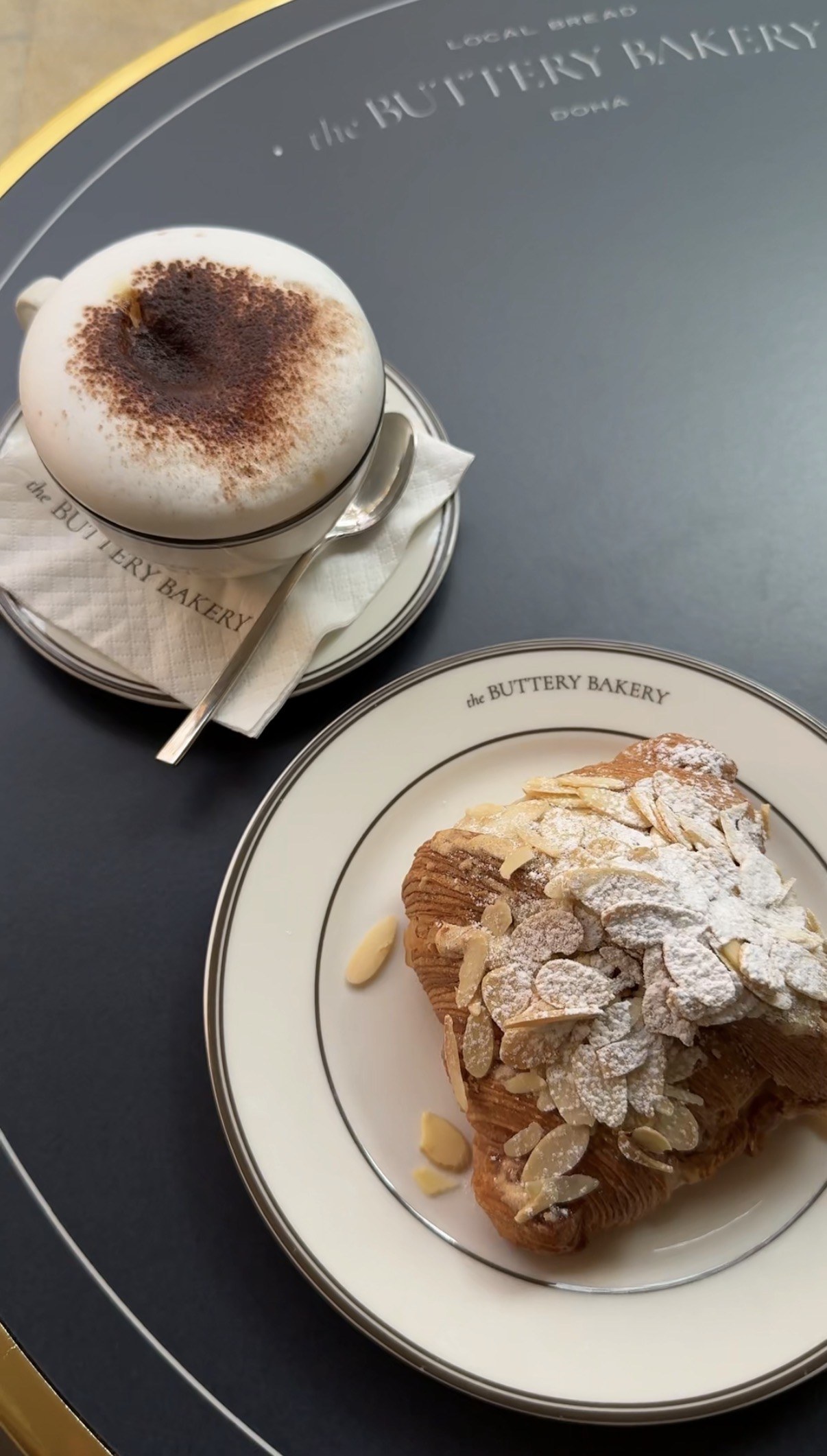 Coffee and pastry set for service, The Buttery Bakery, Doha