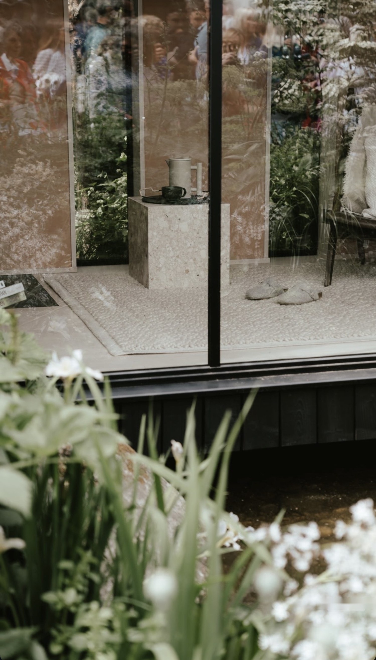 Interior room viewed through glass, RHS Chelsea Flower Show 2022, London