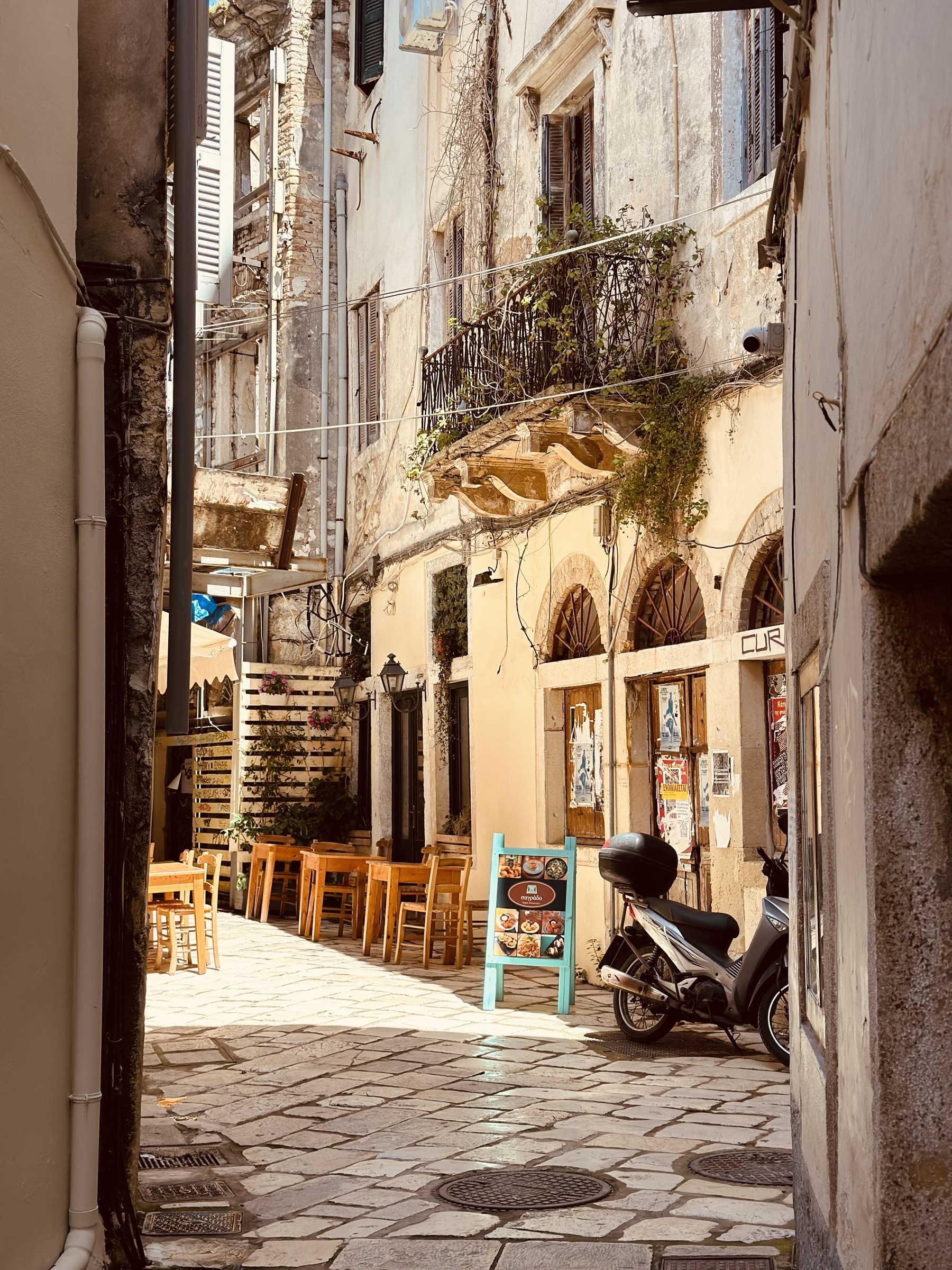 Old town alley through a doorway, Corfu