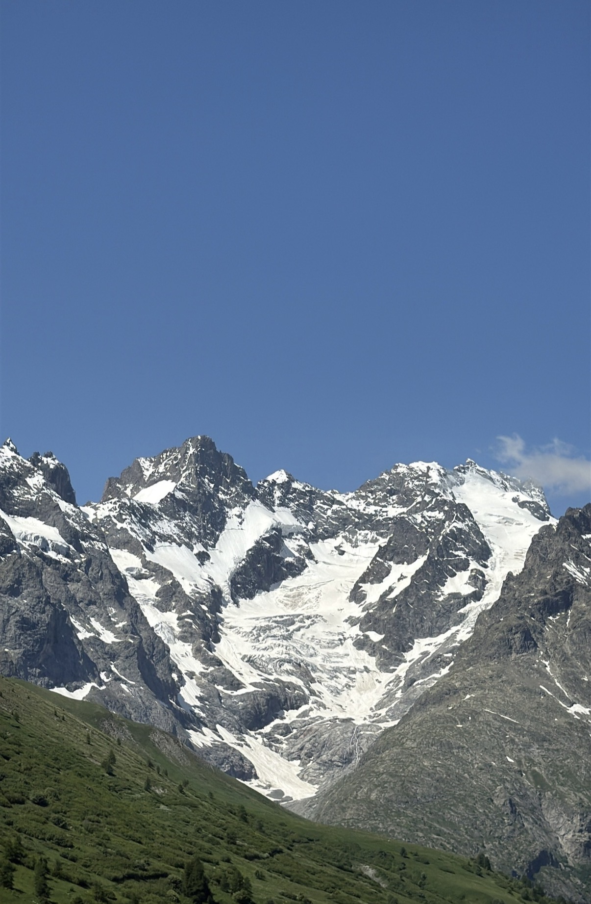 Snow-capped mountain peak under clear sky, French Alps