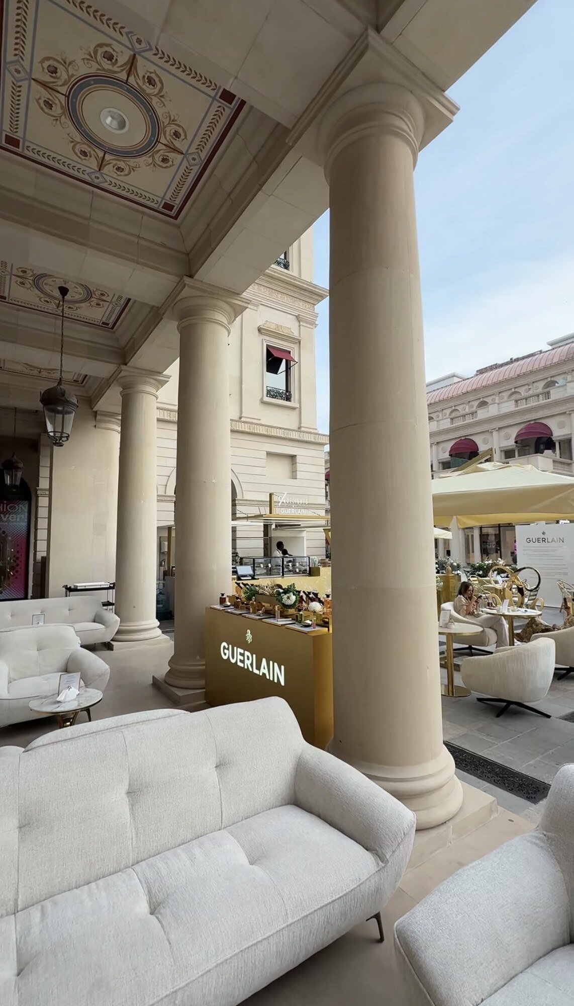 Leaving through the columns, Guerlain boutique, Katara, Doha