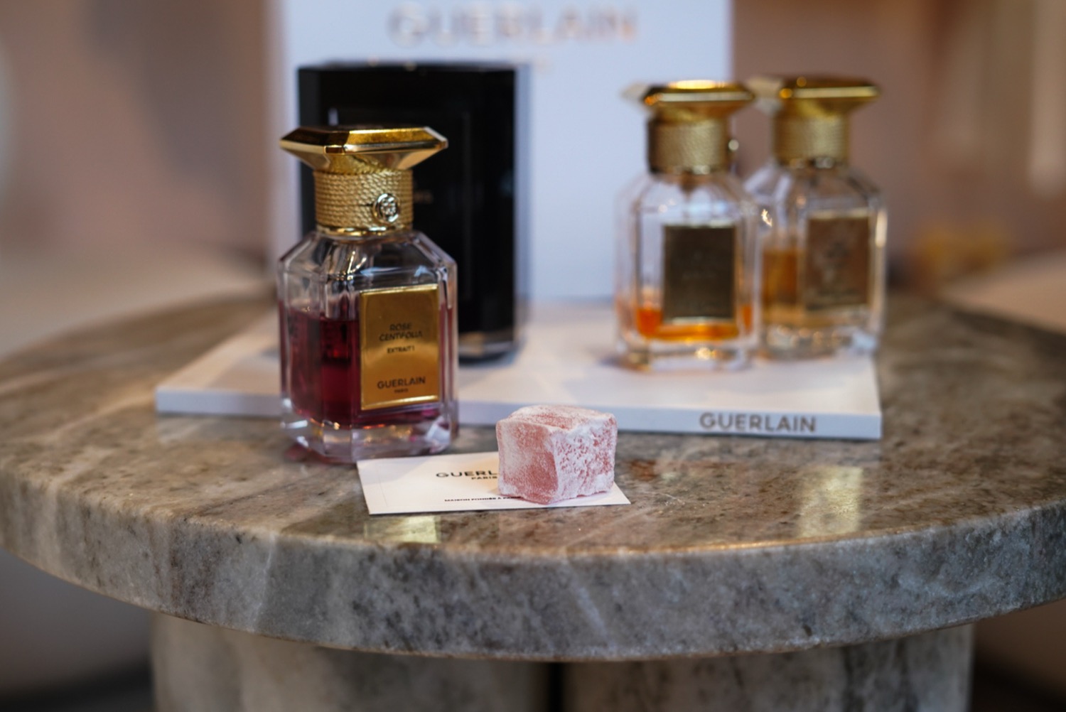 Turkish delight on a Guerlain card in front of Rose Centifolia extrait bottles, Guerlain masterclass, Leeds