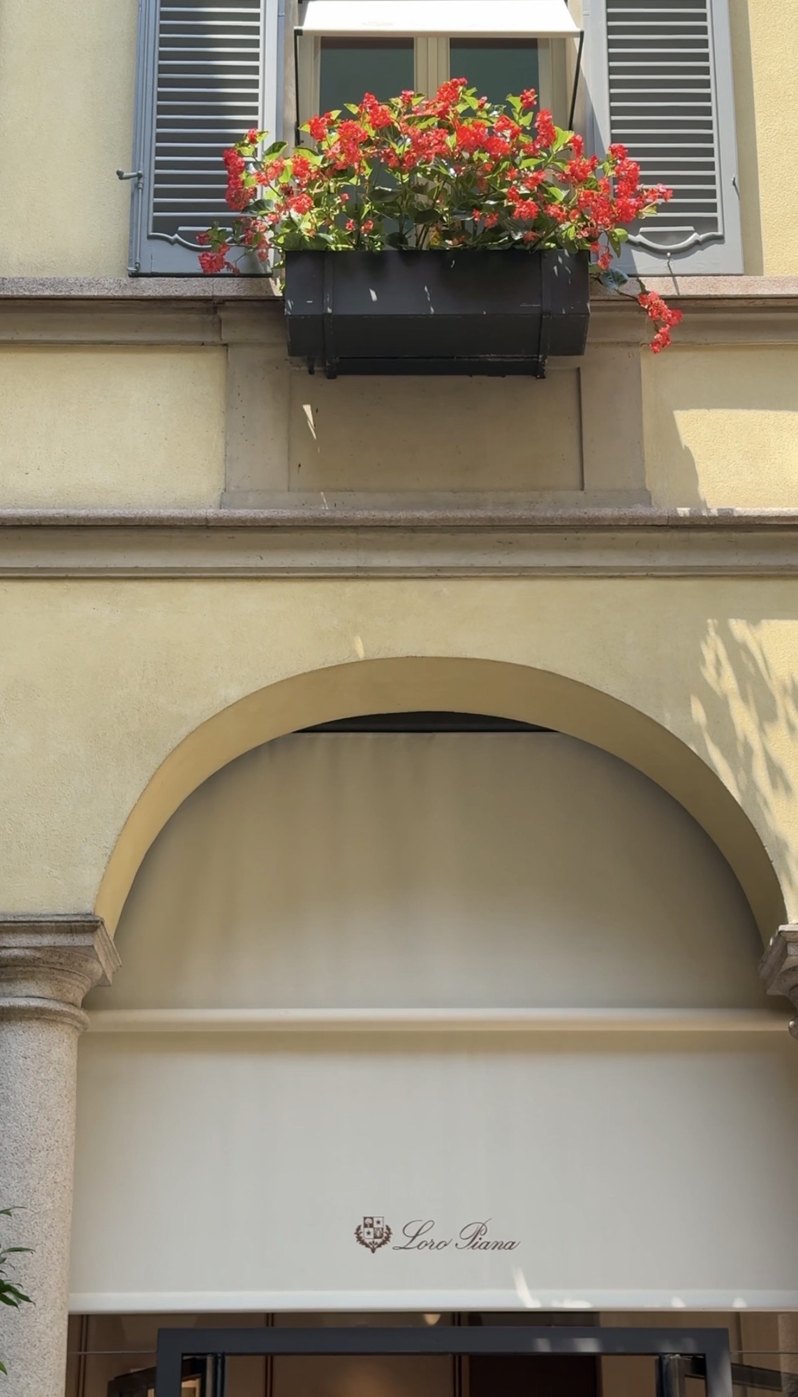 Shutters and awning, Loro Piana boutique, Milan