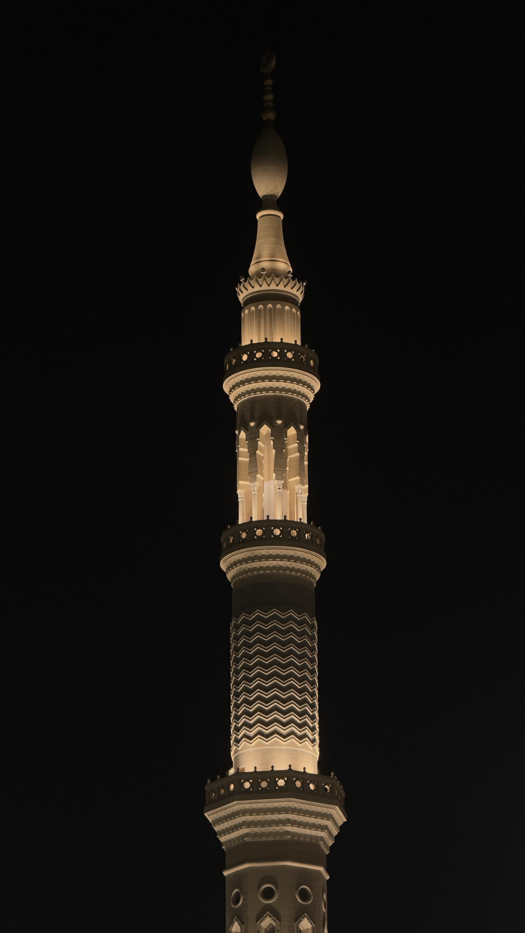 Single minaret at night against a dark sky, Madinah al-Munawwarah