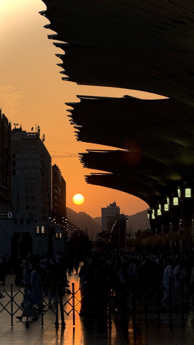 Sunset beneath the mosque umbrellas, Madinah al-Munawwarah