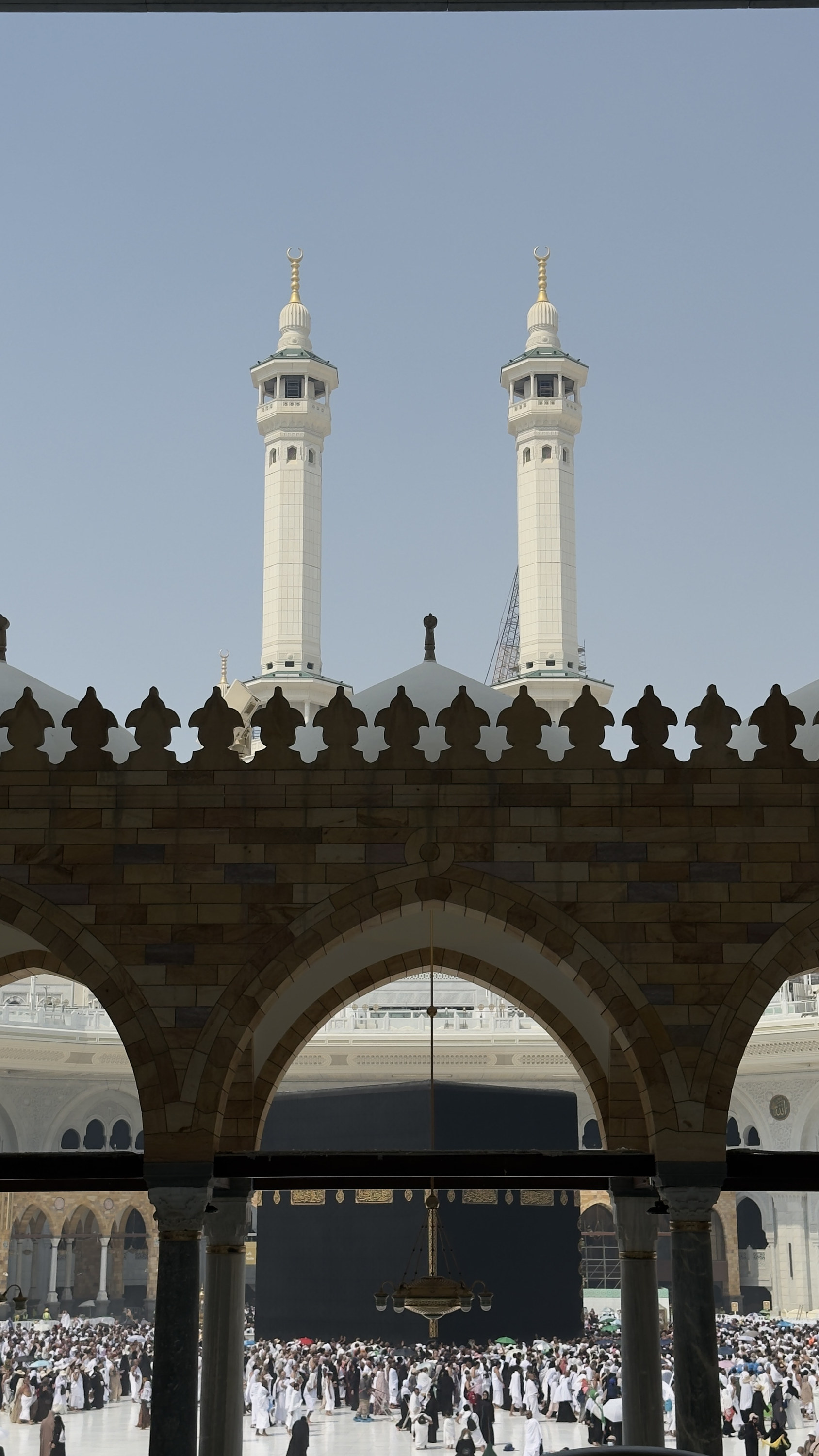 Minarets framed through the courtyard arches, Makkah al-Mukarramah