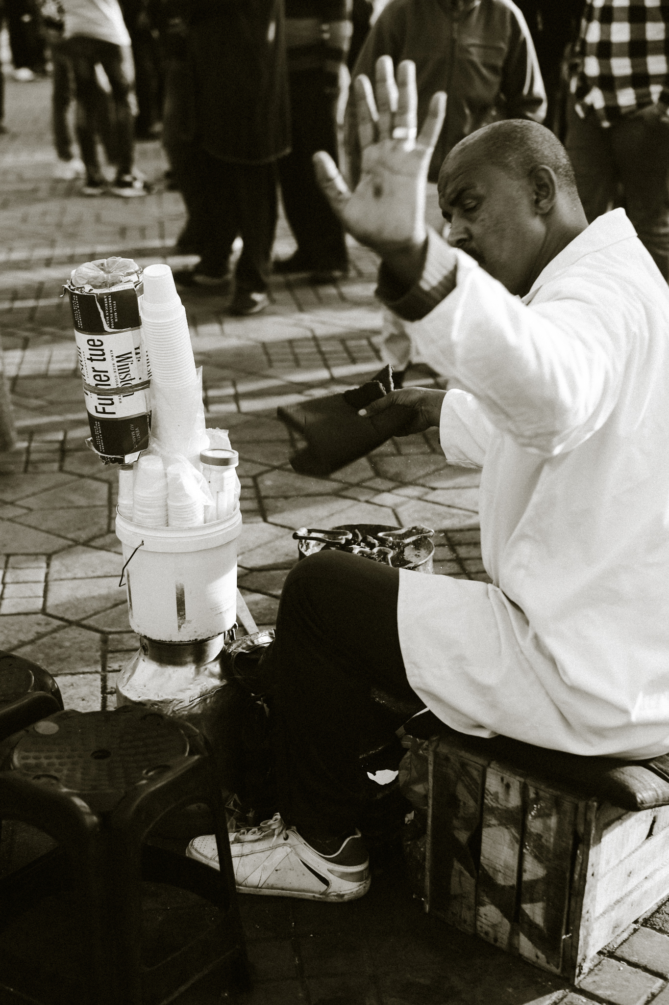 A street vendor mid-gesture, Marrakech