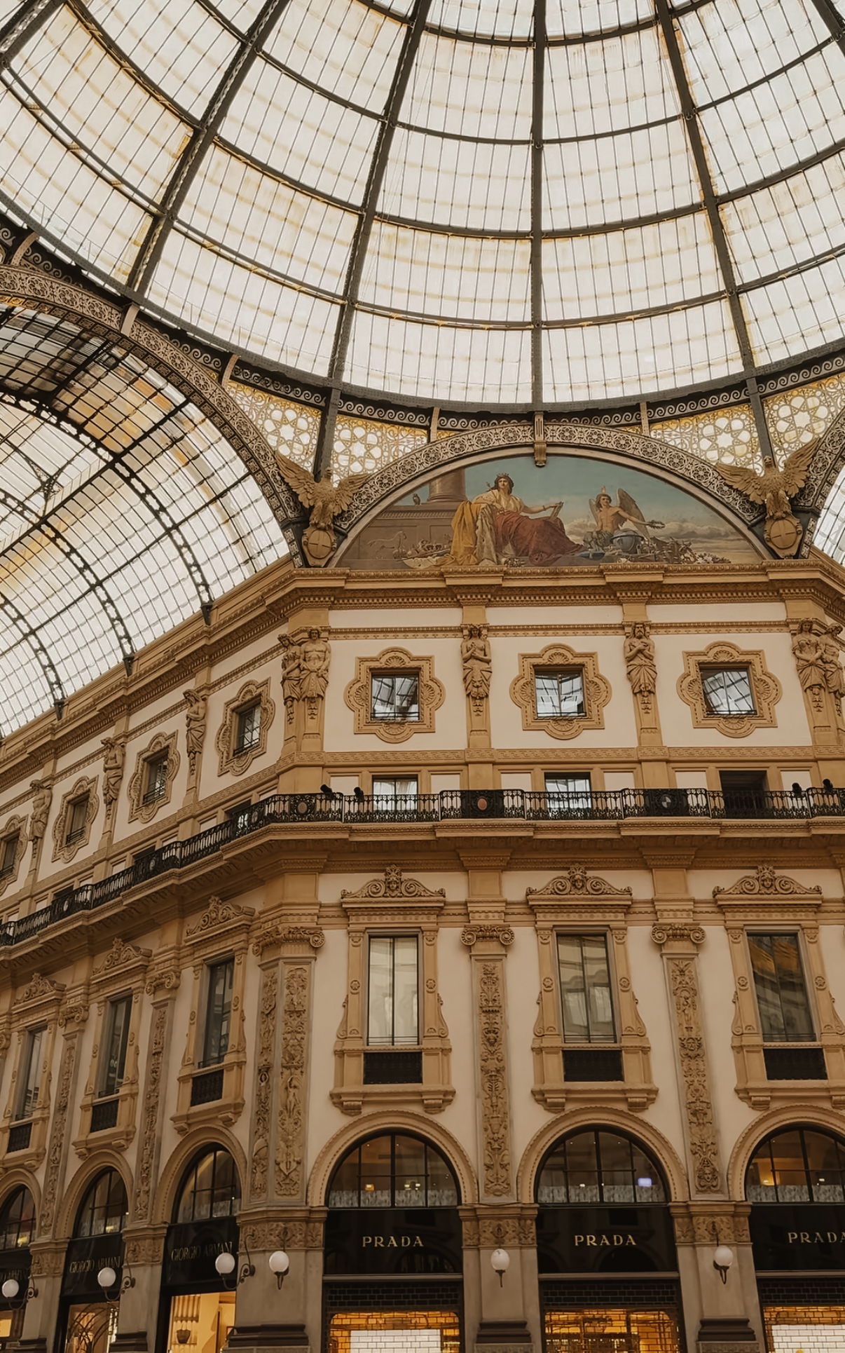 Galleria Vittorio Emanuele II, glass dome and arched facades, Milan
