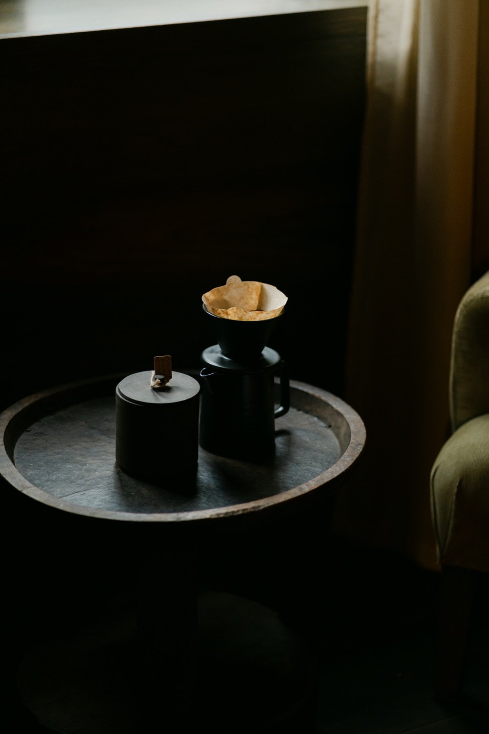 Coffee filter set on a dark tray