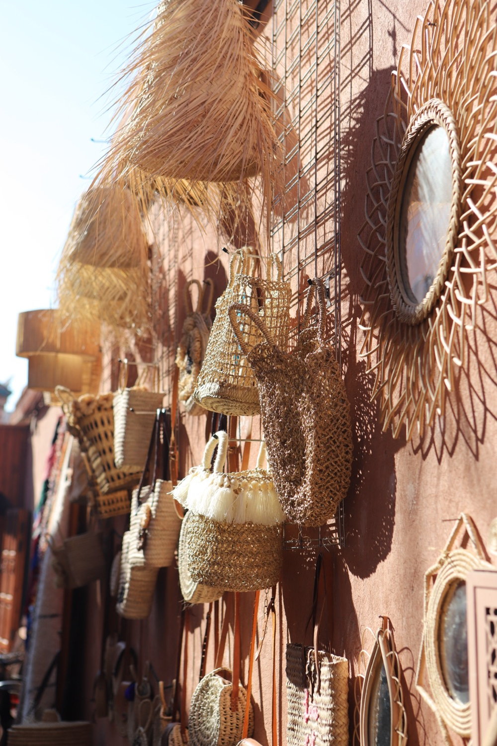 Woven baskets and craft objects on a market table