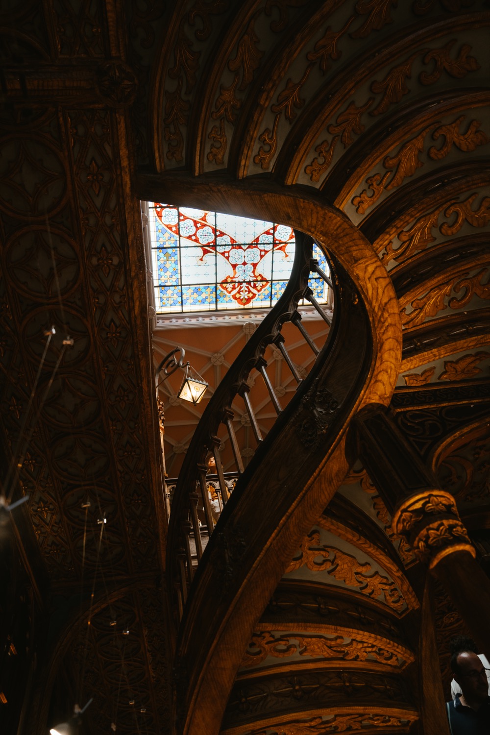 Carved staircase and stained glass, Porto