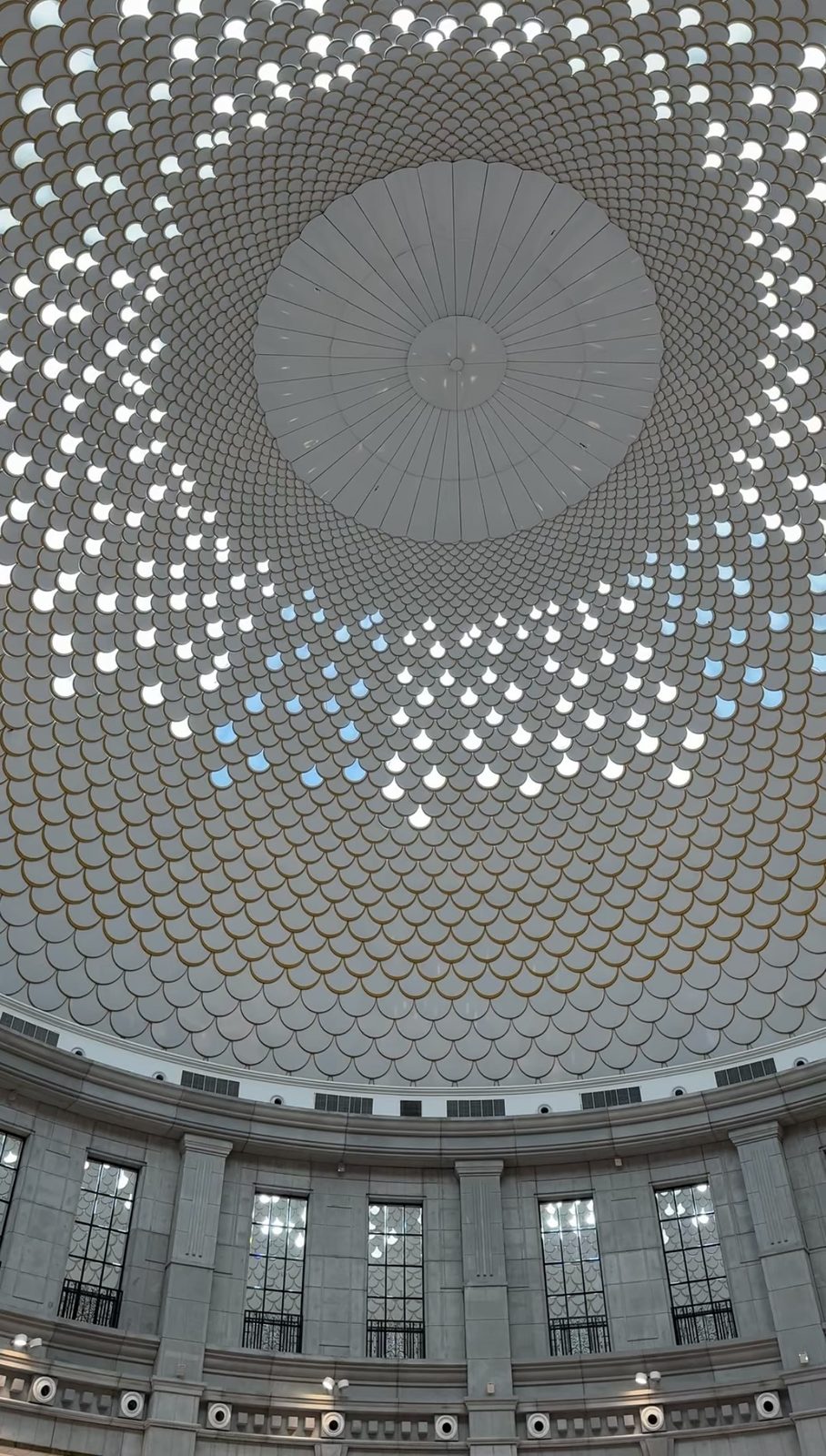 Beneath the scaled dome