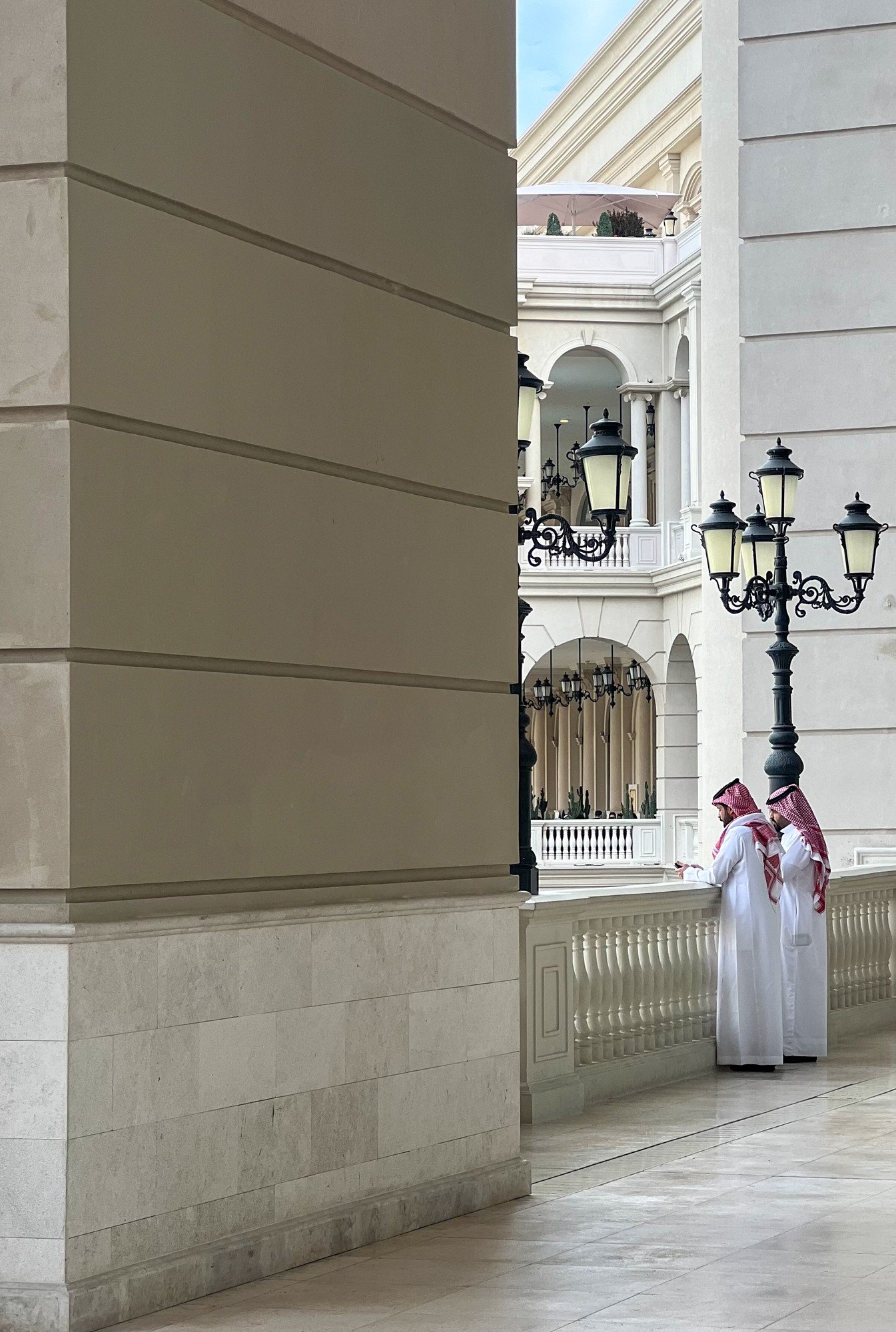 A pause at the balustrade, Place Vendôme, Lusail, Doha