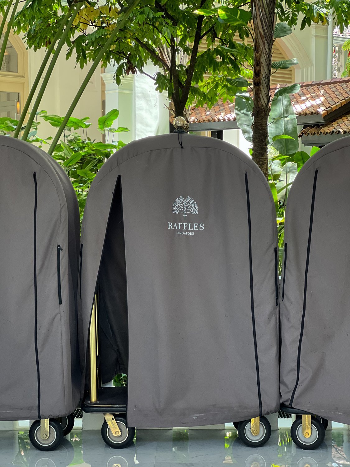 Covered luggage carts, Raffles Hotel, Singapore