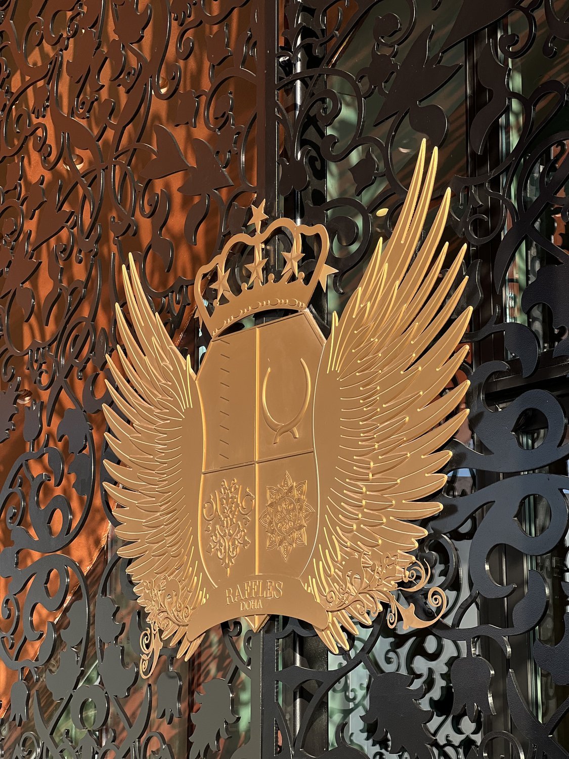 Raffles Doha crest on the gate, Raffles Doha hotel