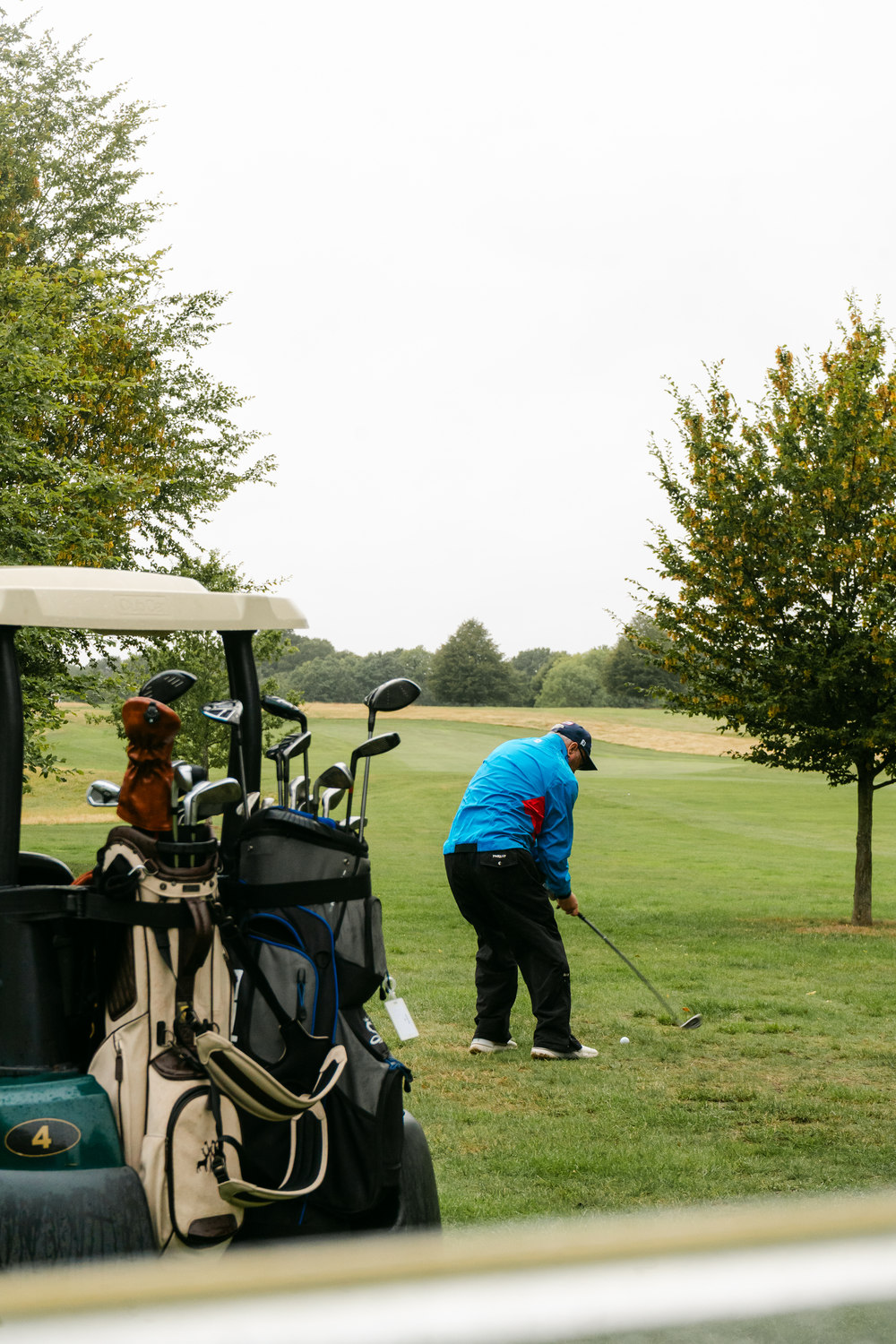 A shot watched from behind a buggy rail, McLaren Construction Group Golf Day, Kent