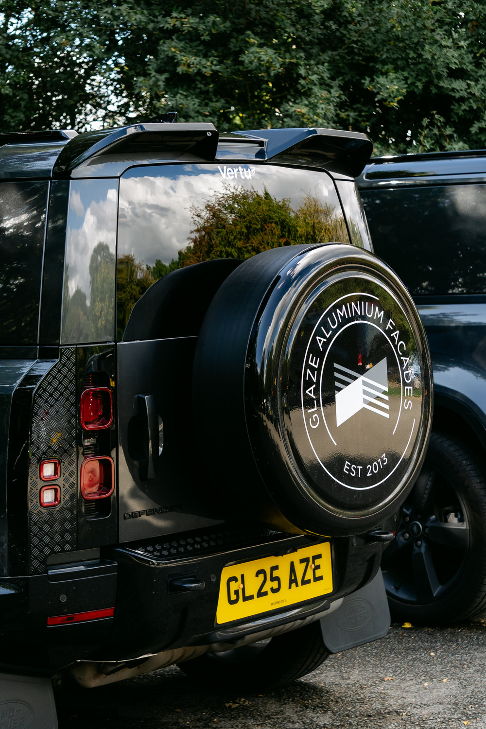 The spare wheel of a vehicle carrying the Glaze mark, McLaren Construction Group Golf Day, Kent