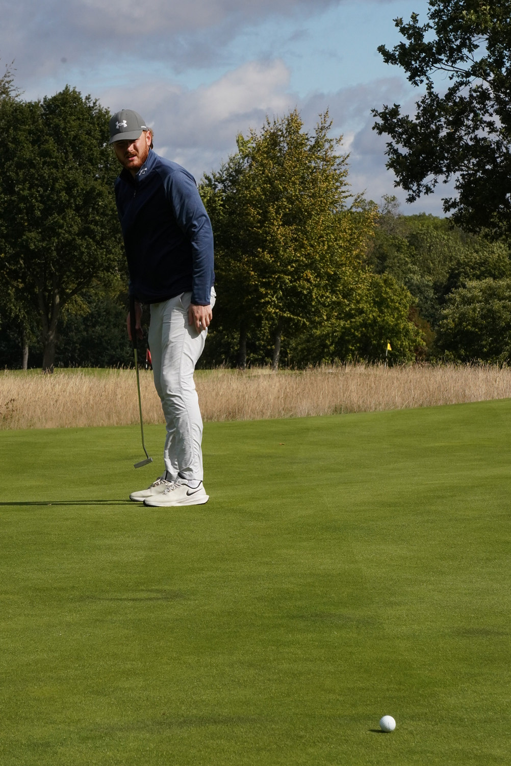 A putt struck on the green, McLaren Construction Group Golf Day, Kent