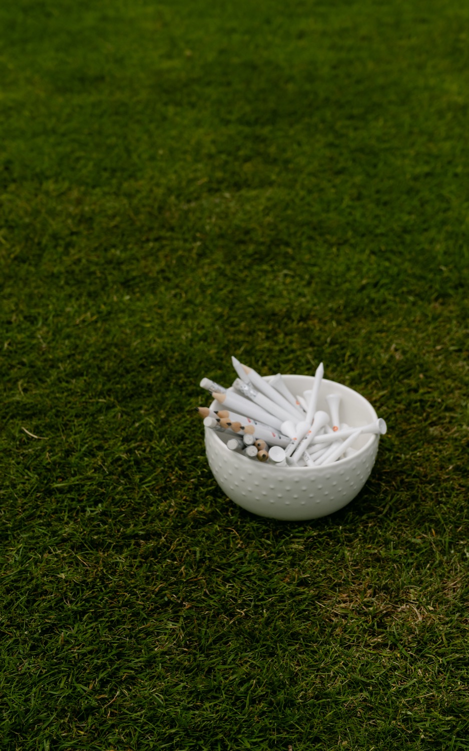 A bowl of white tees resting on the grass, Magnolia Classic, Horsforth Golf Club, Leeds