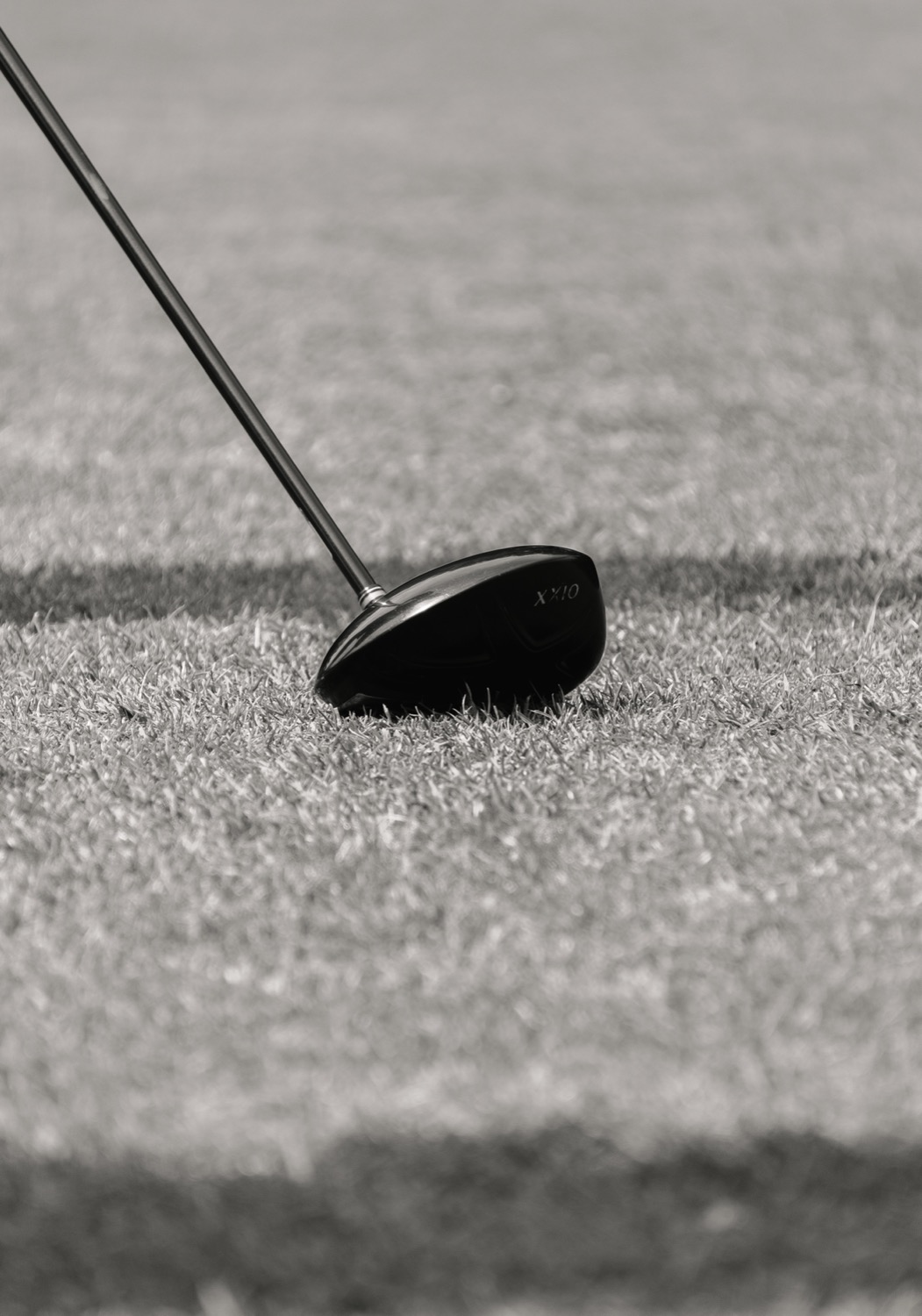 The head of a driver resting against the turf before a shot, Magnolia Classic, Horsforth Golf Club, Leeds
