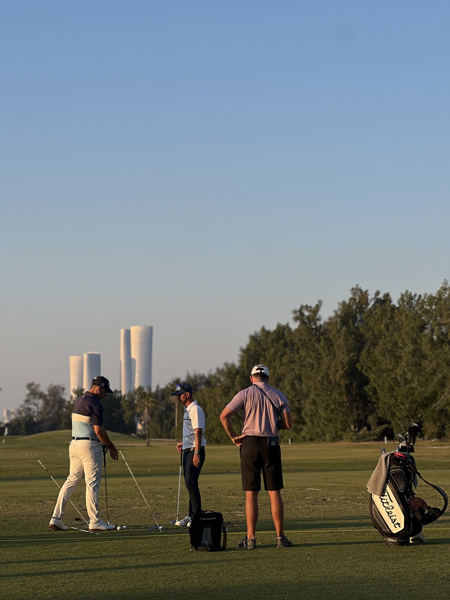 The course at dusk, skyline beyond, Doha Golf Club, Qatar
